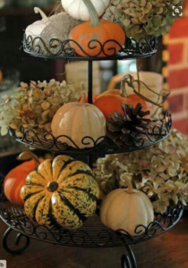 Fall Tiered Tray filled with assorted pumpkins