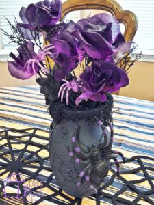 dollar store halloween spider vase with halloween florals