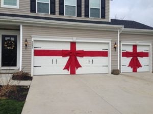 garage door wrapped with bow