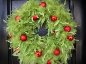DIY Grinch Feather Boa Wreath with red ornaments 