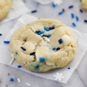 https://www.prudentpennypincher.com/wp-content/uploads/2016/12/blizzard-cookies-cream-cheese-and-sprinkles-and-butter-683x1024.jpg