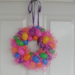 Plastic Egg Wreath with pink easter grass