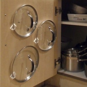 back of cabinet door Lid Storage (using command hooks)