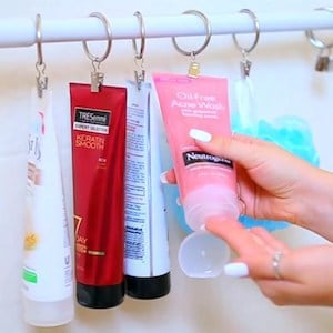 Shampoo and Conditioner Organization with shower curtain clips