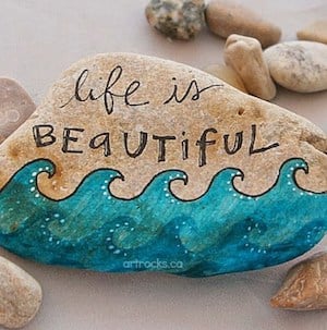 Life is Beautiful Word rock with Waves on the bottom