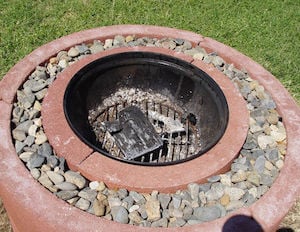 backyard DIY Fire Pit idea Using Concrete Tree Rings