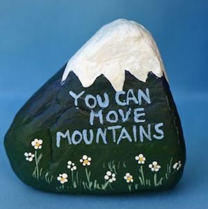 rock painted with You can move mountains