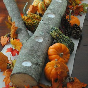 tea light candles in a branch 