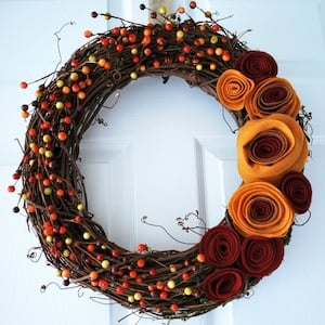 grapevine Wreath with fall berries and Felt Rosettes