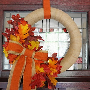 DIY Burlap Fall Wreath with maple leaves and orange bow