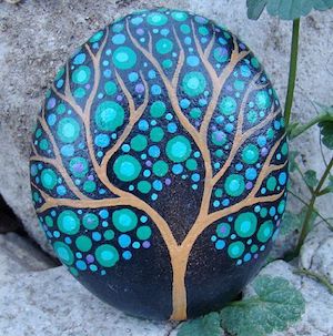 rock painted with branching tree