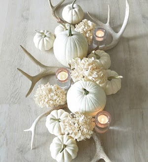 White Thanksgiving Table Decor with White Pumpkins, candles, white mums and antlers