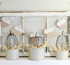 Farmhouse Natural Mantel with chicken wire pumpkins and window frame