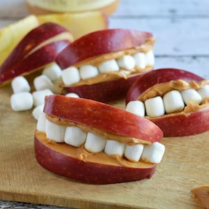 Apple Peanut Butter Teeth Halloween party food idea for kids