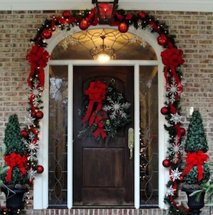 Christmas entrance with bows, ornaments and snowflakes