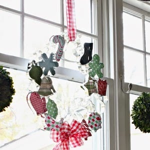 Christmas Cookie Cutter Wreath in kitchen window