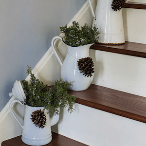 Christmas Pitchers on stairs 