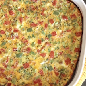 Overnight Breakfast Egg Casserole with Peppers, Onions and Tomatoes