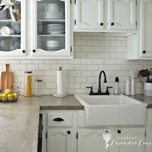 white kitchen cabinets with farmhouse kitchen sink