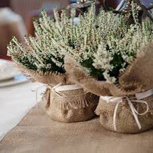 Flowers in Burlap Bags Tied with Ribbons
