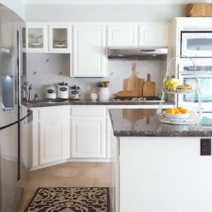 Affordable Farmhouse Kitchen makeover with stainless steel appliances