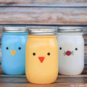 mason jars with birds, chicks, and rabbits