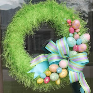Easter wreath of grass and eggs to decorate the front door