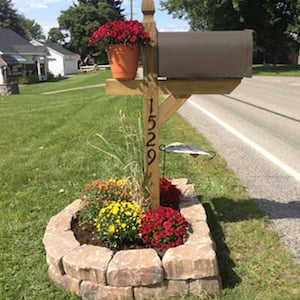mailbox with flower landscaping