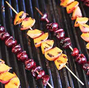 Grilled Peaches and Cherries with Cinnamon-Honey Syrup