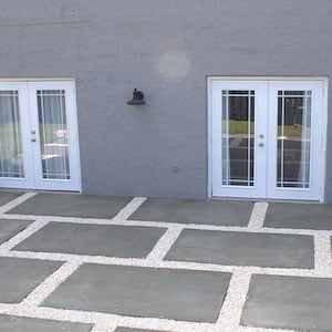 Poured Cement Pavers and Gravel Patio