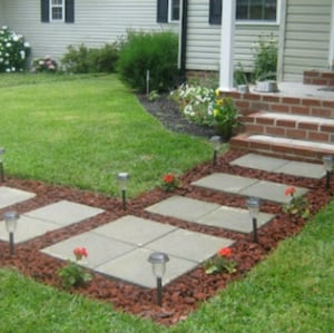 walkway using Lava Rocks and Pavers Curb Appeal