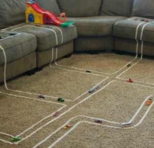 Masking Tape Speedway Track for Toy Cars in the living room