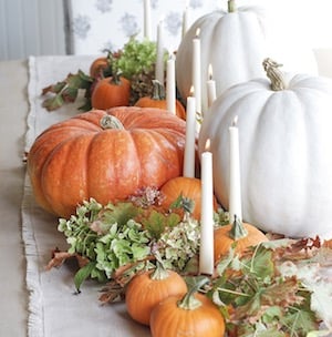 Thanksgiving Table Decor with pumpkins, greenery and taper candles 