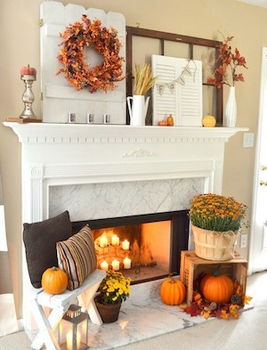 Fall Mantel with layered fall decor 