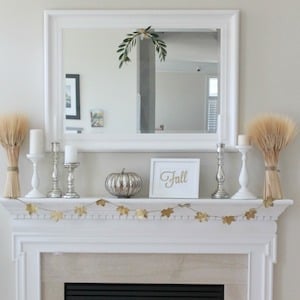 Neutral Autumn Mantel with wheat and fall leaf garland