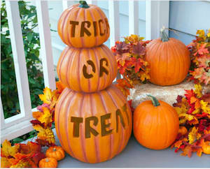 Trick or Treat Carved Pumpkins on the porch