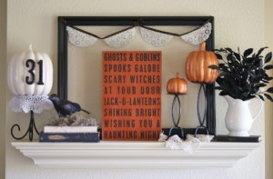 black white and orange halloween mantel