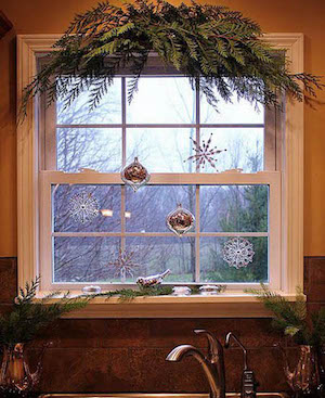 Natural Evergreen hanging above Christmas Kitchen Window 