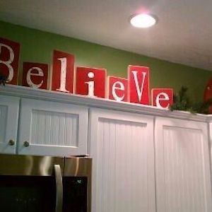 Believe Sign Above Kitchen Cabinet Christmas Kitchen Decor