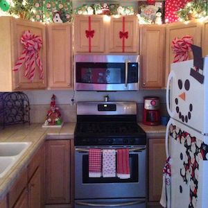 Festive Christmas Kitchen with bows on cabinets