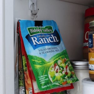 Binder Clip Packet Holder hanging in pantry