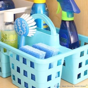 Under the Kitchen Counter $1 Caddy organization for the cabinet