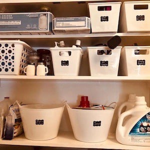 laundry room organization using plastic dollar store bins