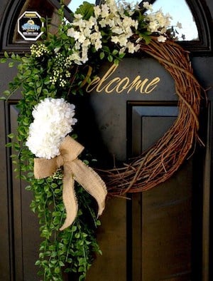 Asymmetrical grape vine flower wreath