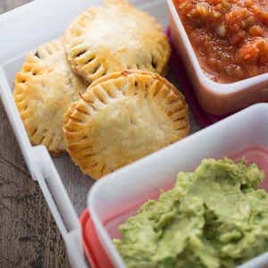 Mini Taco Hand Pies lunch box idea with guacamole and salsa