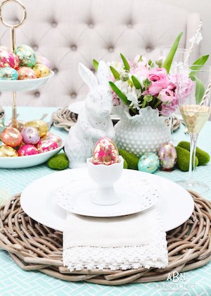 Bright and Colorful Table Decor with tiered tray filled with gold leaf Easter eggs