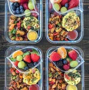 Egg Muffin meal prep containers with fruit