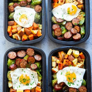 Paleo meal prep breakfast bowls with sausage, potatoes and egg