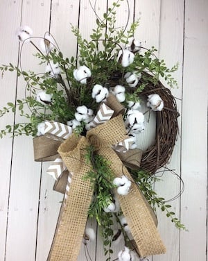 Farmhouse Cotton Wreath with greenery and a burlap bow