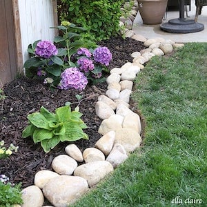 River Rock Planter Border DIY backyard idea